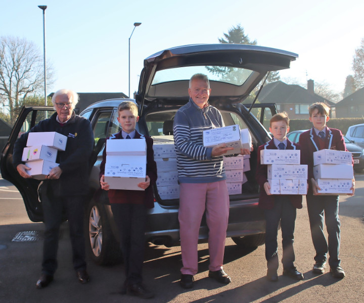 collecting boxes from Beacon boys school